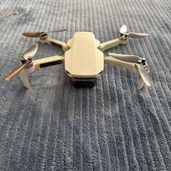 DJI Mini 2 Bundle – 4 Batteries, Charging Hub, 128GB SD, Bag & More!