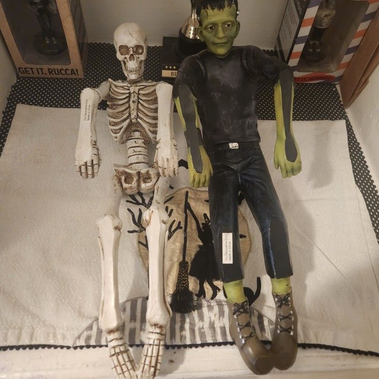 Frankenstein And Skeleton Being Dragged Statues