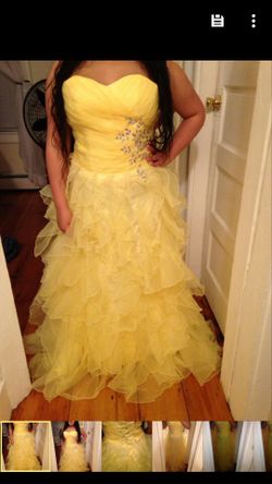Yellow dress size 12,never worn. Can be for a prom or sweet sixteen. Asking for $150 or best offer