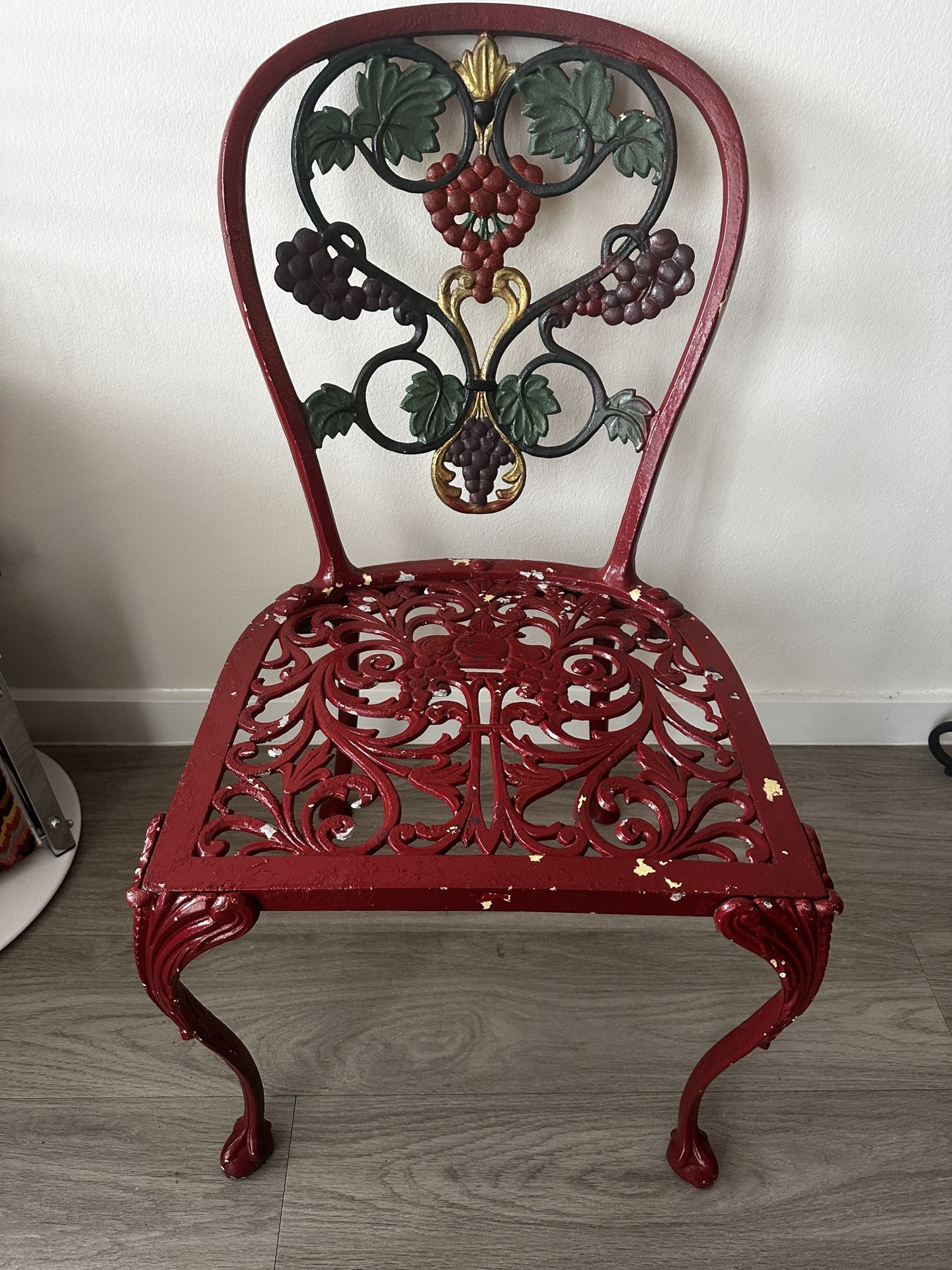 Wrought Iron Chair with Grape Vine Motif
