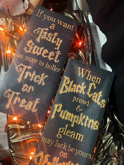 Pair of Kim Lewis Halloween signs