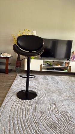 Adjustable Bar Stool with Black Faux Leather Seat