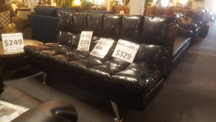 Brand new black leather sofa futon