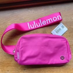 BNWT Lululemon Sonic Pink Belt Bag With White Wordmark On Strap