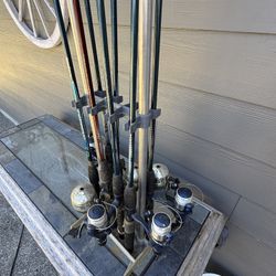 Fishing Rod Holder And Old Poles And Reels