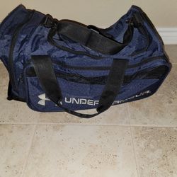 Bag. It is available. Exact cash preferred. Has 1 inside tear. Large enough to hold 2 basketballs.