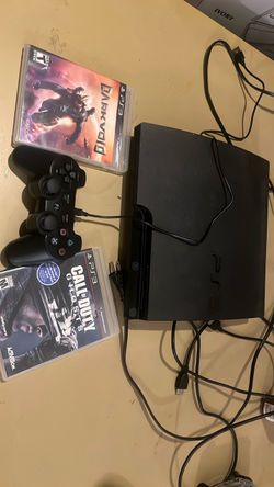 PS3 slim  3001A  w 2 games and one control