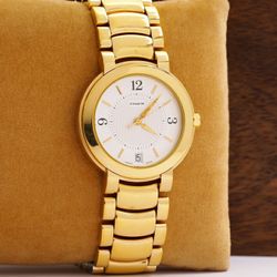 Ladies coach watch gold