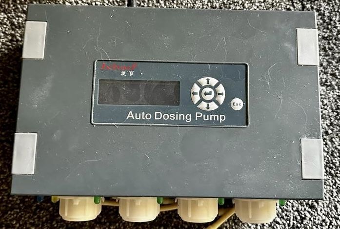 Jebao Programmable Auto Dosing Pump DP-4 Black. Willing to negotiate price.