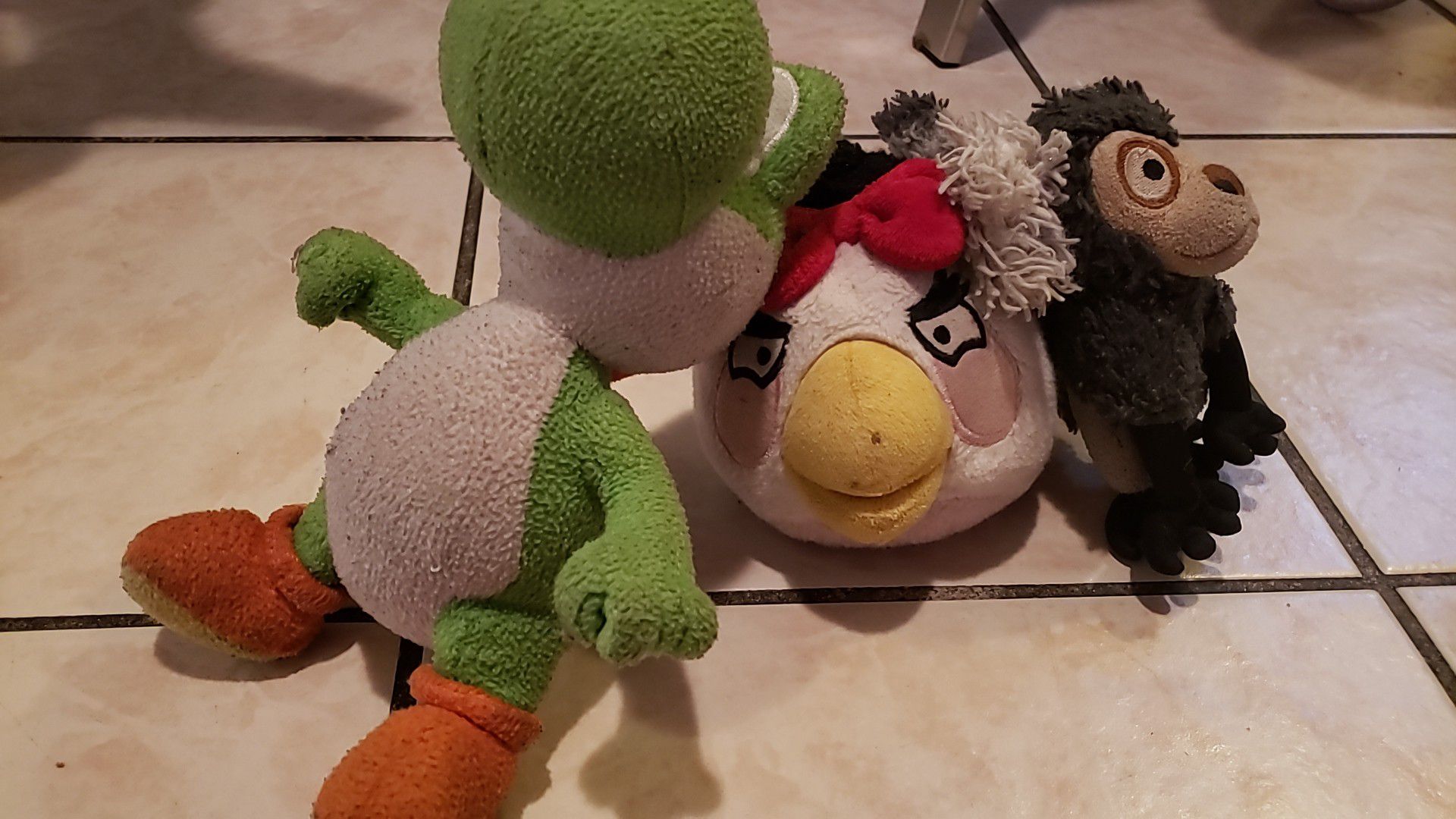 Yoshi, White Bird, and Monkey Plush Toys