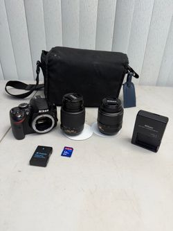 Nikon D3200 DSLR Camera Nikon DX 18-55mm VR & Nikon DX 55-200mm ED Sd Card Read. Used in good with some cosmetic blemishes. These blemishes are in t