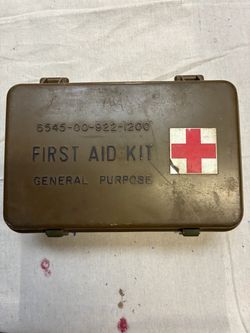 vintage U.S. military general-purpose first aid kit box marked with the National Stock Number (NSN) 6545-00-(contact info removed). [1]