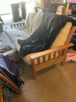Futon with black mattress cover