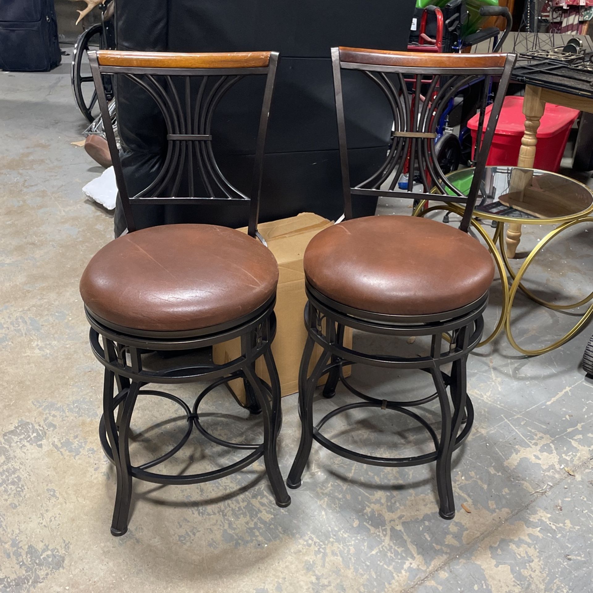 Two Swivel Chairs
