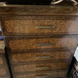 Dresser and a chest address have two mirrors