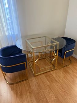 Round dining table with chairs