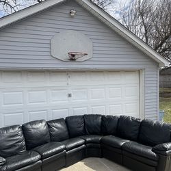 ( Free Delivery ) Black Reclining Faux Leather Sectional Couch