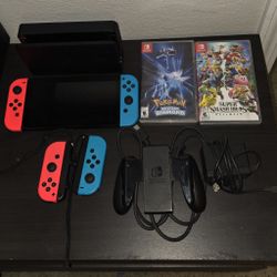 OLED Nintendo Switch w/ extra joycons and games