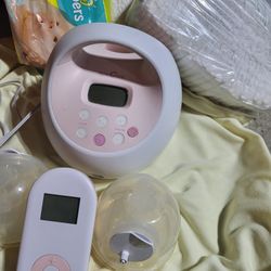 2 Breast Pumps With A Hands Free And A Spectra Breast Pump + Hands Free Wearable Breast Pump + 3 Unopened Packs Of Pampers Newborn Diapers