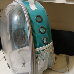 Lollimeow bubble backpack cat carrier. Holds up to 13 lb. Minor scratches on plastic is noted in photos.
