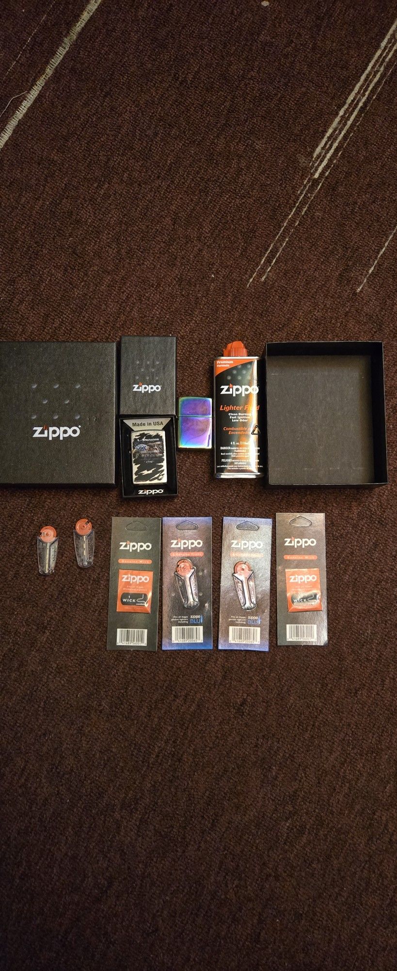 Two Zippo Lighters With Extras