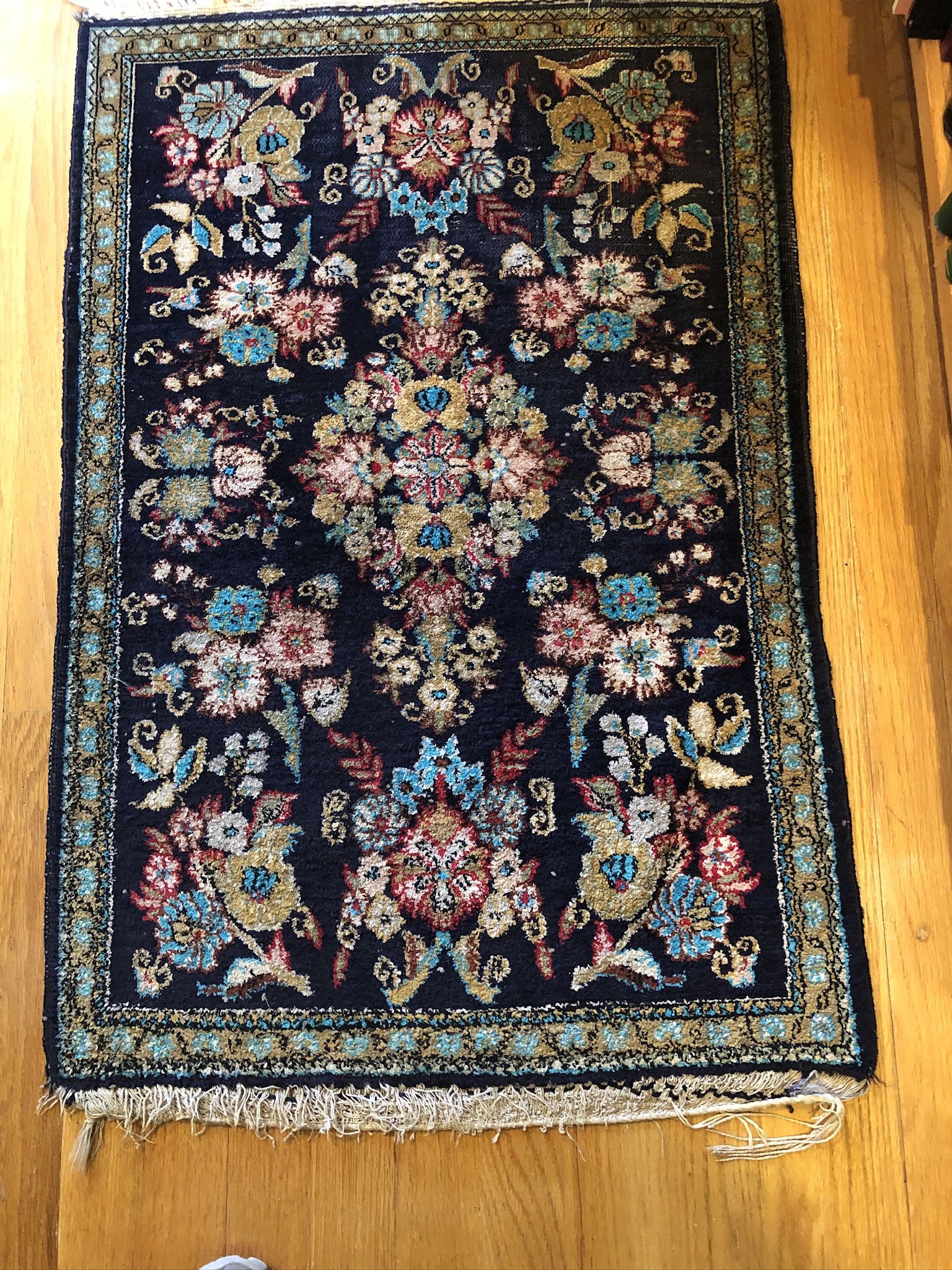 Magnificent 100% handmade silk rug from Iran. It is handwoven in the town of Ghom (Iran) where most silk rugs are made. Size is 23” x 35”. It comes fr
