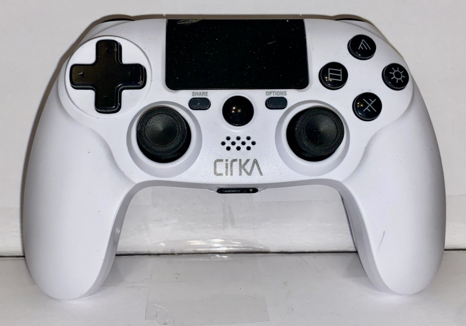PS4 wireless controller, white, Circa brand, used in good condition, tested