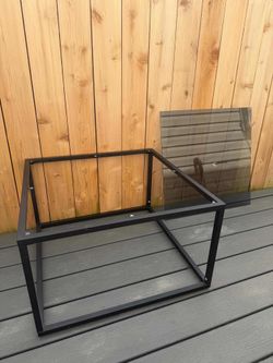 Glass table with metal frames
