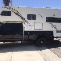 MONTANA CAB OVER  CAMPER 11.5 FEET LONG FULL SELF CONTAINED CLEAN INSIDE OUT