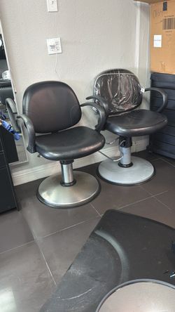 2 stylist chairs missing food rest