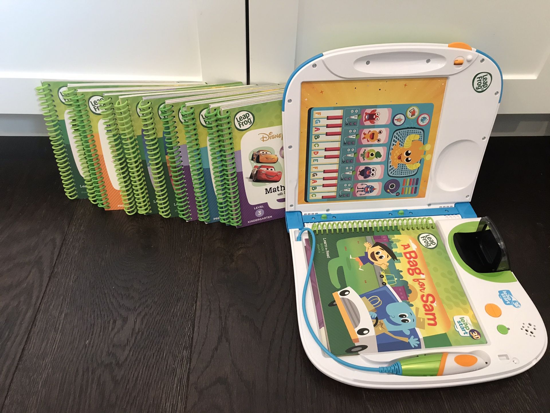 Leapfrog Leapstart learning system with books up to kindergarten level