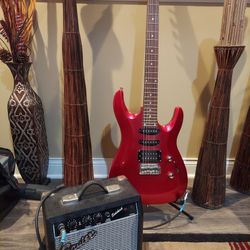 electric guitar with amplifier and stand