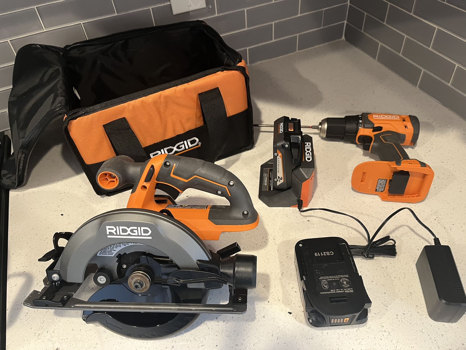 Rigid Circular Saw And Drill Combo Basically New. 2 Batteries And Charger. Lithium Ion Batteries 18volt. Basically New.