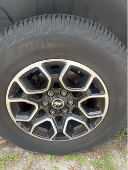 Set of 4 18in bronco rims and tires