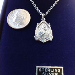 Sterling Silver Our Mother Of Perpetual Help Medal On An 18-in Stainless Steel Chain. Sacred Heart Of Jesus On Back.