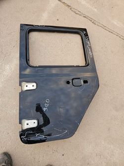 Jeep Wrangler left rear door Oem