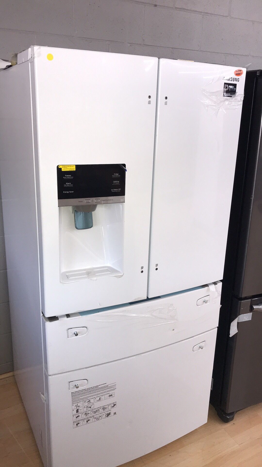 Brand new 33’ white 4 door refrigerator with water dispenser