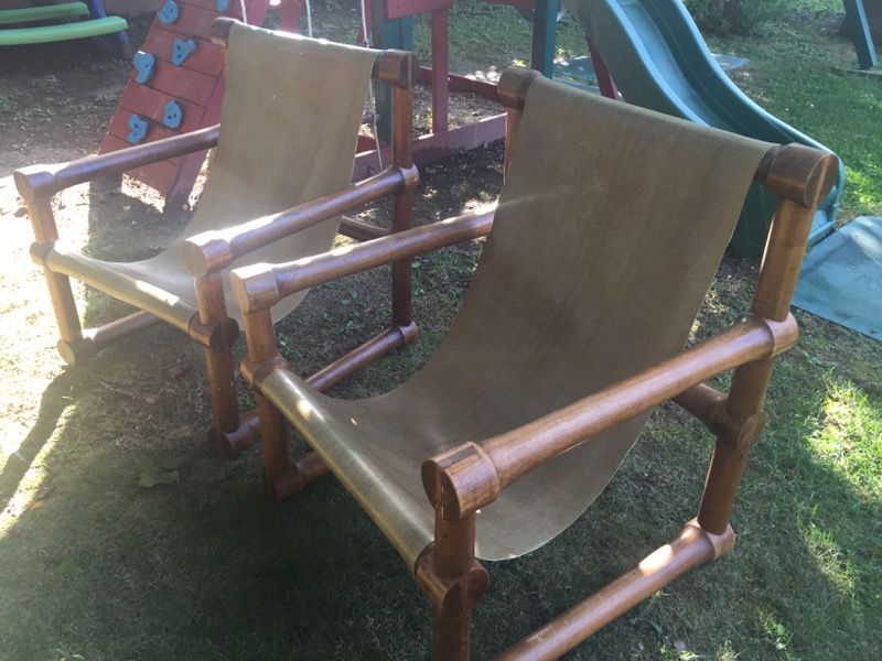 Antique leather sling-back chairs
