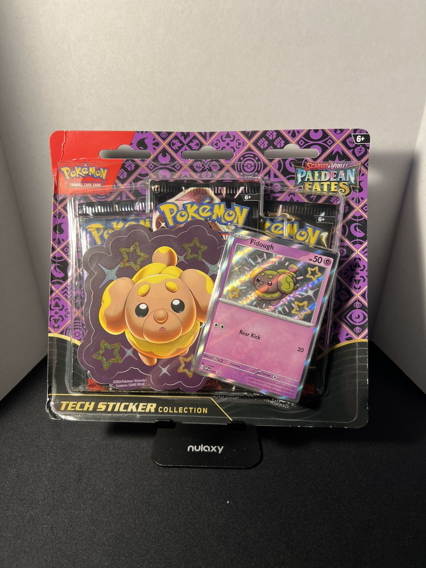 Pokémon Paldean Fates Sticker Collection Packs – Fidough & Maschiff