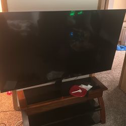 TV AND STAND TOGETHER 75in Roku Tv