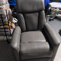 Grey leather swivel recliner