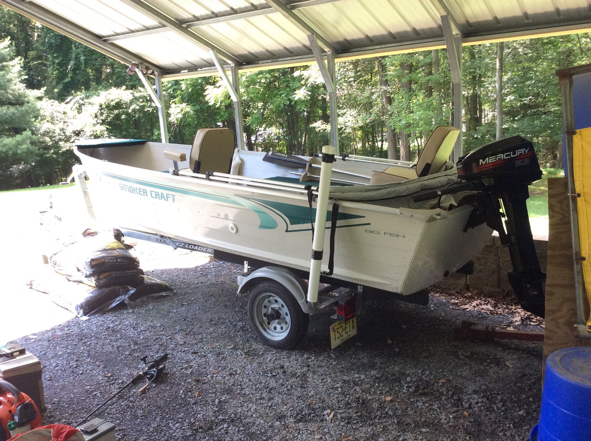16 foot smoker craft with 9 .9 Mercury engine new trailer live bait
