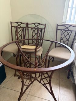 round glass table with 4 chairs