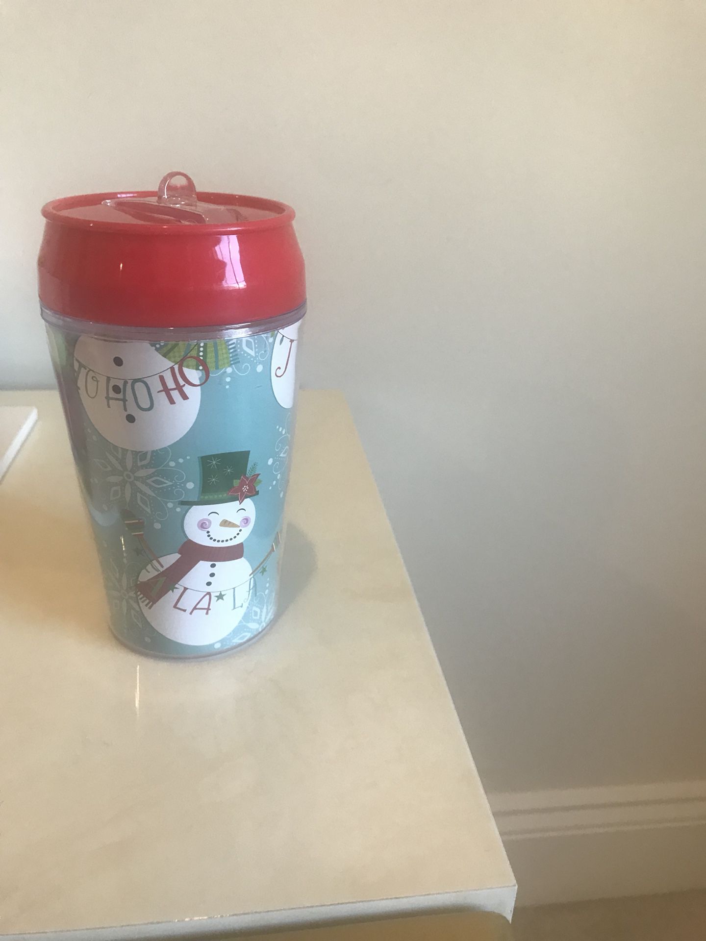 Snowman themed plastic tumbler with flip up straws