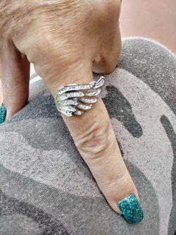 Brand new genuine stamped 925 sterling silver and white topaz chip stones size 8 & 1/2