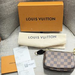 LV Mini Pochette Accessoires (used)