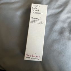 Rare Beauty liquid highlighter shade “mesmerize”