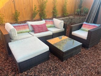 Wicker Patio Furniture Set with Sectional, Armchair, and Coffee Table
