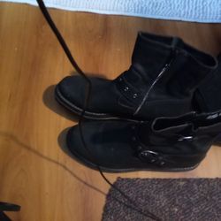 Two Pairs Of Boots One Black High Top Work Boots For Men And Brown Thigh High Boots For Women