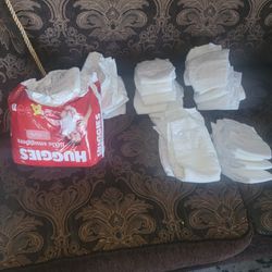 50 Newborn Diapers Huggies/ Pamper Swaddlers 